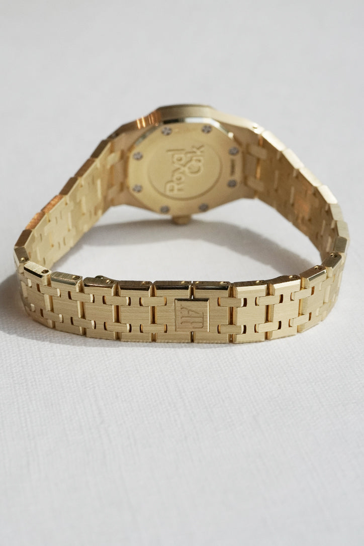 Audemars Piguet 67630BA.OO.1312BA.03-B Royal Oak 23 Mini 18K Yellow Gold MOP Dial