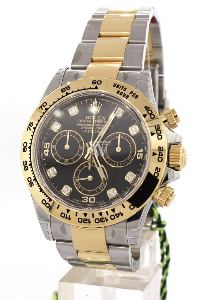 Rolex daytona steel and gold black dial top